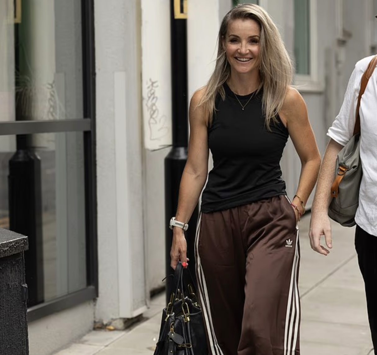 Helen Skelton walking alongside Gethin Jones
