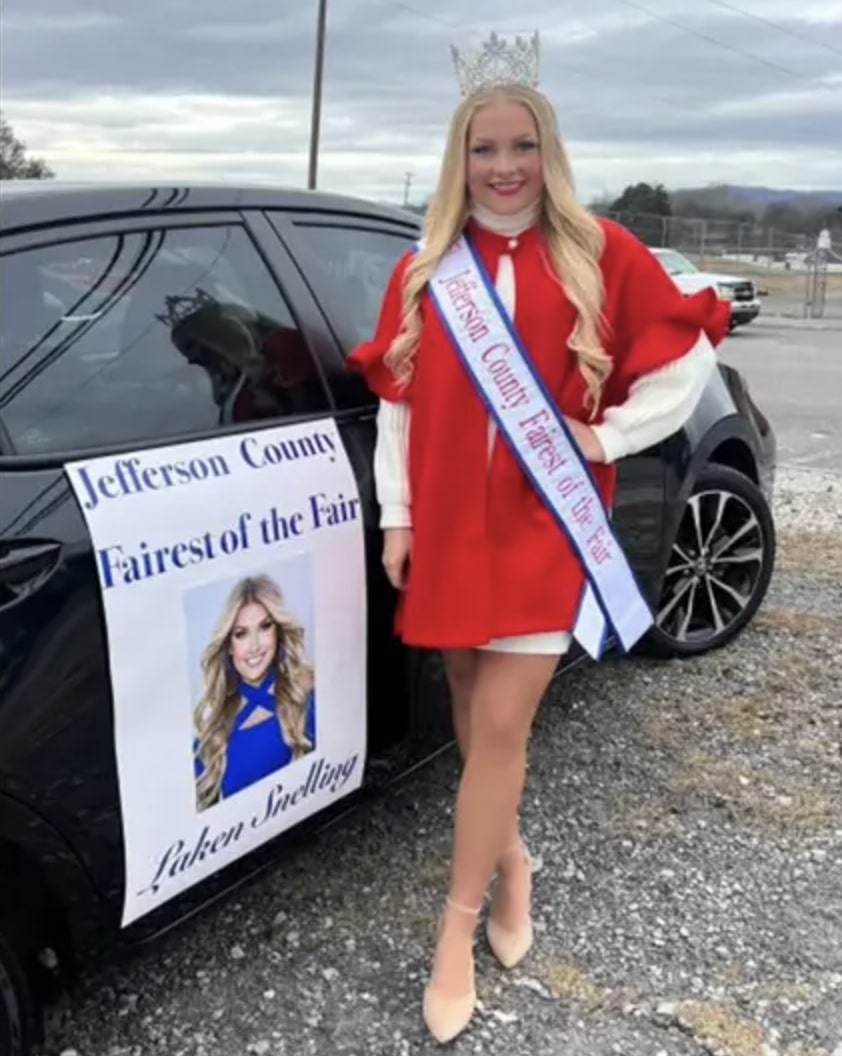 Cheer team paying tribute with flowers