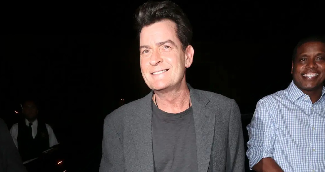 Charlie Sheen smiling during a public event