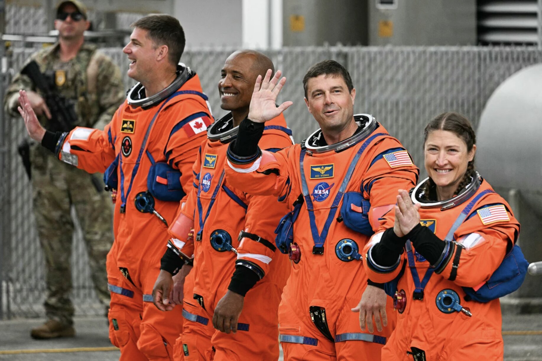 Artemis II astronauts Jeremy Hansen Victor Glover Reid Wiseman and Christina Koch walking out before boarding Orion spacecraft